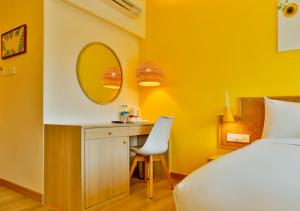 Postel nebo postele na pokoji v ubytování Bloom Hotel - Juhu