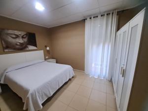 Postel nebo postele na pokoji v ubytování Trip Barcelona Spain