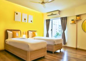 Postel nebo postele na pokoji v ubytování Bloom Hotel - Juhu