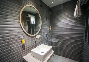 Koupelna v ubytování Bloom Hotel - Juhu
