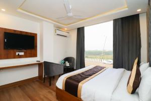 Postel nebo postele na pokoji v ubytování Hotel View - A Boutique Hotel