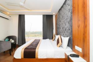Postel nebo postele na pokoji v ubytování Hotel View - A Boutique Hotel