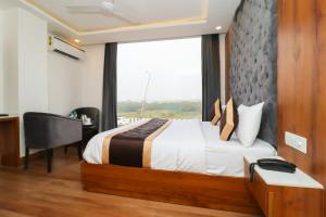 Postel nebo postele na pokoji v ubytování Hotel View - A Boutique Hotel