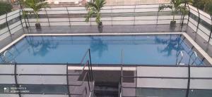 Bazén v ubytování Hotel Bhaskar nebo v jeho okolí