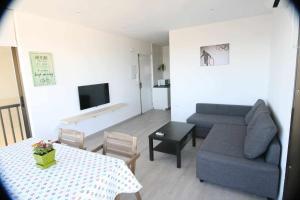 TV a/nebo společenská místnost v ubytování Minva apartamento junto al mar