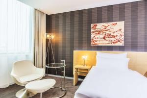 Postel nebo postele na pokoji v ubytování NH Bratislava Gate One