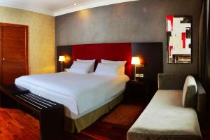Posteľ alebo postele v izbe v ubytovaní Hotel NH Poznan
