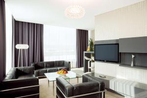 TV a/nebo společenská místnost v ubytování NH Bratislava Gate One