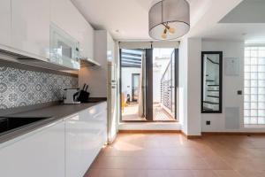 Kuchyňa alebo kuchynka v ubytovaní Suites San Pablo