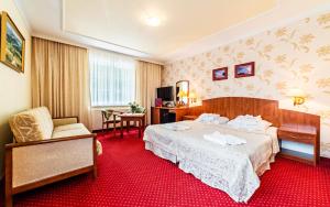 Łóżko lub łóżka w pokoju w obiekcie Karkonoski SPA - Bufet mini All Inclusive gratis!