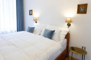 Posteľ alebo postele v izbe v ubytovaní Parkhotel Vrbno