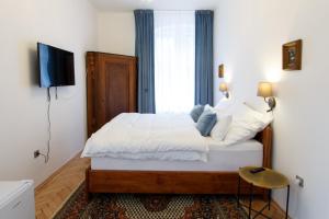 Posteľ alebo postele v izbe v ubytovaní Parkhotel Vrbno