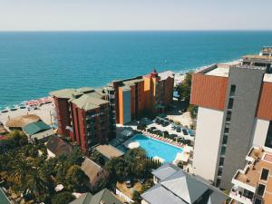 an aerial view of a resort and the ocean at Neptun Palace Kvariati in Kvariati