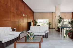 Posezení v ubytování NEW VIP piscina y gimnasio