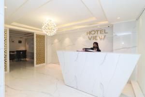 Členové personálu v ubytování Hotel View - A Boutique Hotel + 37 fotografií