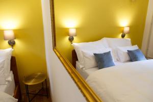 Posteľ alebo postele v izbe v ubytovaní Parkhotel Vrbno