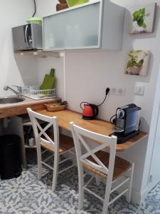 Una cocina o kitchenette en Appartement rénové et cosy au calme