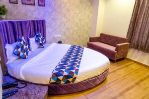 Ένα ή περισσότερα κρεβάτια σε δωμάτιο στο Hotel Lee Grand