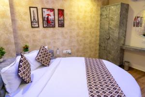 Ένα ή περισσότερα κρεβάτια σε δωμάτιο στο Hotel Lee Grand
