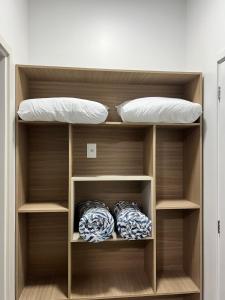 a bunk bed with two beds in a room at HOTEL Recanto dos Bambus em PALMEIRINHA in Guarapuava