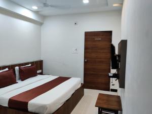 Rúm í herbergi á Hotel Nova Prime
