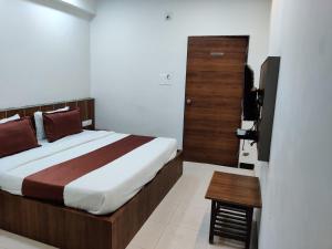 Rúm í herbergi á Hotel Nova Prime