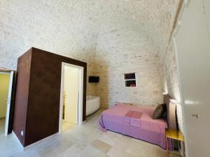 A bed or beds in a room at Antico Corso 74