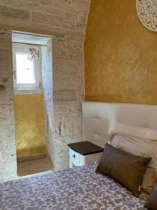 A bed or beds in a room at Antico Corso 74
