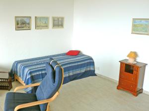 Postel nebo postele na pokoji v ubytování Apartment Residence Miralago - Utoring Apt- A6 by Interhome