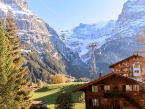 a view of a mountain with a ski lift at Apartment Bodmisunne by Interhome in Grindelwald