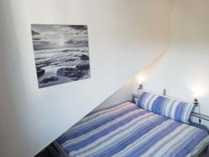 Postel nebo postele na pokoji v ubytování Apartment Flodana by Interhome