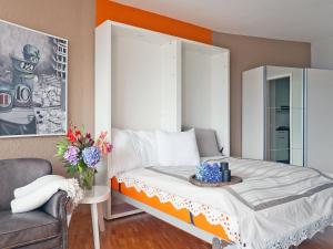 Gulta vai gultas numurā naktsmītnē Apartment Double Room Modern-11 by Interhome