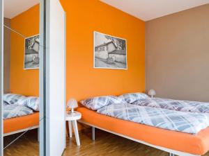 Tempat tidur dalam kamar di Apartment Suite Modern-13 by Interhome