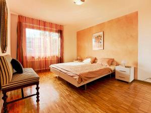 Cama ou camas em um quarto em Apartment Junior Suite Classic-21 by Interhome