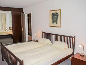 Postel nebo postele na pokoji v ubytování Apartment Residenza Parcolago Apt-008 by Interhome