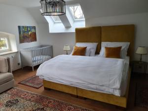 Posteľ alebo postele v izbe v ubytovaní Parkhotel Vrbno