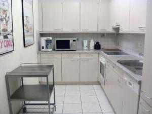 Apartment Utoring Acletta-125 by Interhome tesisinde mutfak veya mini mutfak