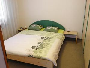 Apartment Utoring Acletta-150 by Interhomeにあるベッド