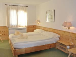 Katil atau katil-katil dalam bilik di Apartment Residenza Chesa Margun 34-8 by Interhome