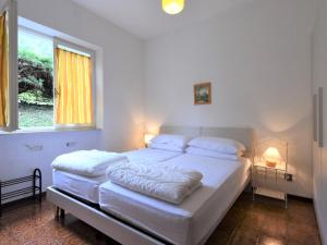 A bed or beds in a room at Holiday Home Villa Laura-5 by Interhome