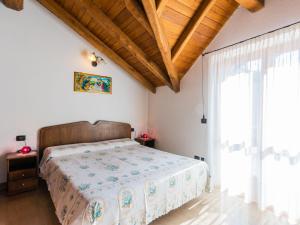 Posteľ alebo postele v izbe v ubytovaní Holiday Home Rosa - VNA205 by Interhome