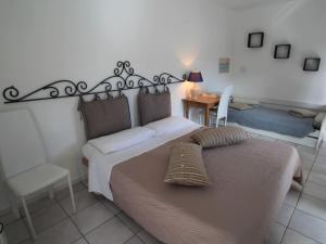 Postel nebo postele na pokoji v ubytování Holiday Home Rosemarie by Interhome