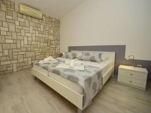 Postel nebo postele na pokoji v ubytování Holiday Home Moreška-1 by Interhome