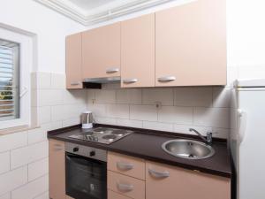 Kjøkken eller kjøkkenkrok på Apartment Balota by Interhome