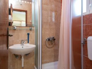 a bathroom with a sink and a shower at Apartment Balota by Interhome in Viganj