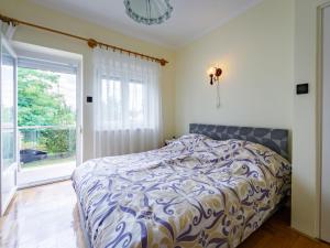 Posteľ alebo postele v izbe v ubytovaní Apartment Daisy 1 by Interhome