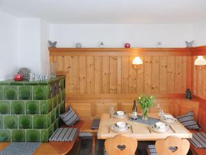 a dining room with a table and chairs at Holiday Home Drachenfels by Interhome in Dittishausen