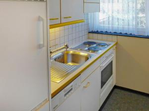 Apartment Matten - Utoring-15 by Interhomeにあるキッチンまたは簡易キッチン