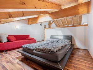 A bed or beds in a room at Apartment Achtalgut-2 by Interhome