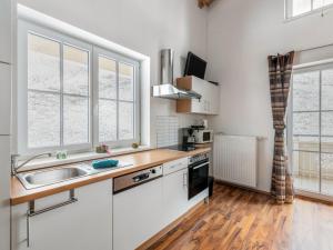 Kuchyň nebo kuchyňský kout v ubytování Apartment Grün by Interhome